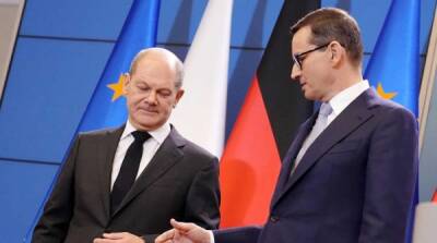 Новый канцлер Германии поссорился с польским премьером на первой же встрече
