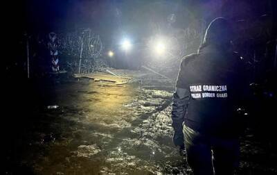 При прорыве границы Польши мигранты повредили автомобили полиции