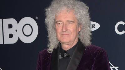 «Настал шокирующий день»: гитарист Queen заболел COVID-19