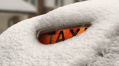 Снегопад в Киеве: таксисты резко повысили цены на проезд