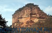В Китае восстановили около 100 буддийских скульптур, высеченных в скале