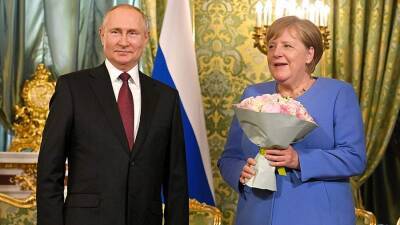 Путин в телеграмме Меркель выразил надежду на продолжение дружеского общения