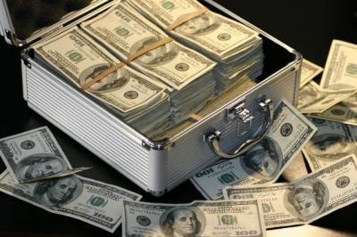 Доллар на открытии торгов Мосбиржи подешевел до 75,6 рубля