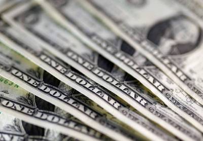 Средний курс доллара США со сроком расчетов "завтра" по итогам торгов составил 74,1508 руб.