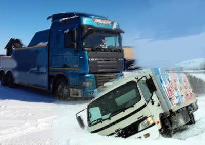 В Москве за сутки эвакуаторы вытащили 387 грузовиков, застрявших из-за снегопада