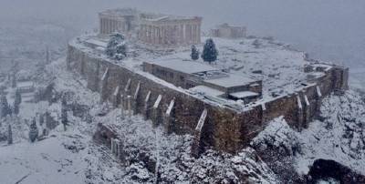 Мощный снегопад обрушился на столицу Греции Афины - ТЕЛЕГРАФ