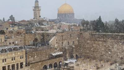 Впервые за восемь лет Иерусалим засыпало снегом