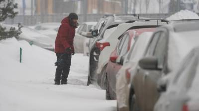 Водителей в Подмосковье попросили отказаться от поездок в выходные из-за снегопада