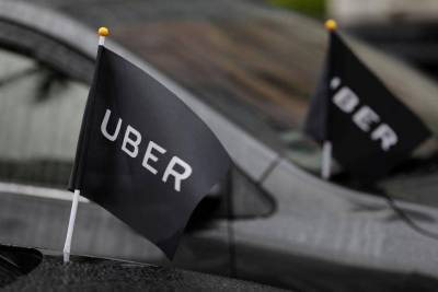 Uber упал на премаркете, Deere и Novavax выросли