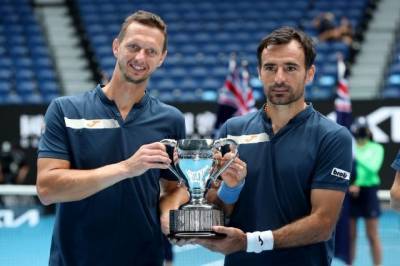 Хорват Додиг и словак Полашек победили на Australian Open в парном разряде