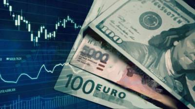 Биржевой курс рубля снизился ка доллару и вырос к евро