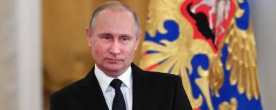 Путин поздравил жителей России с Днем защитника Отечества