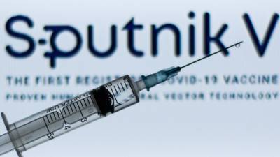 Путин предупредил о провокациях на фоне успеха российской вакцины "Спутник V"