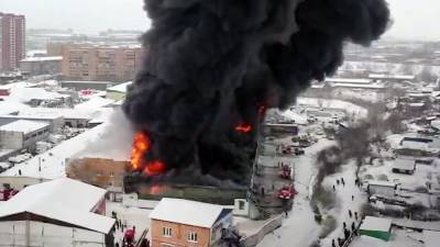 Названа предварительная причина пожара на складе в Красноярске