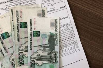 Россиян вновь начнут штрафовать за неуплату услуг ЖКХ - Известия