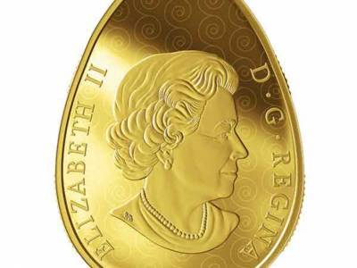 В Канаде выпустили золотую монету в форме украинской писанки с портретом Елизаветы II