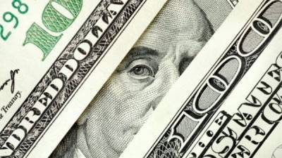 Доллар 5 февраля умеренно укрепляется к другим мировым валютам