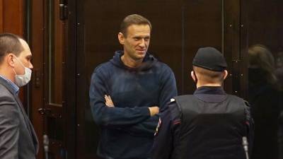 Песков назвал агрессивной риторикой требование Байдена освободить Навального