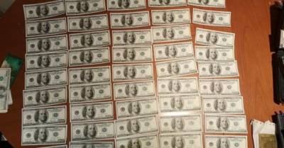 СБУ и полиция задержали группу фальшивомонетчиков, делавших &quot;почти настоящие&quot; доллары