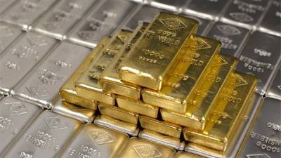 Цены на золото и серебро 8 февраля колеблются на укреплении доллара