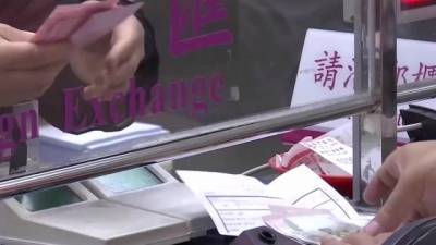 Жителям Китая заплатят за отказ от традиционных денег