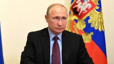 Путин поздравил главу МОК с переизбранием