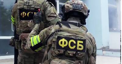 В оккупированном Крыму ФСБ задержала двух украинцев за возложение цветов к памятнику Шевченко