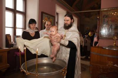 Что во время крещения ребенка входит в обязанности крестного