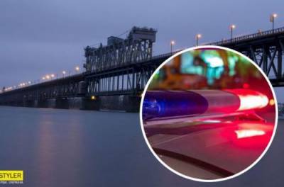 В Кременчуге женщины держали за ноги самоубийцу, прыгнувшего с моста. ВИДЕО