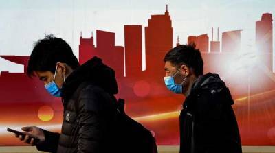 Китай упростит въезд иностранцам, вакцинированным от COVID-19 его препаратом