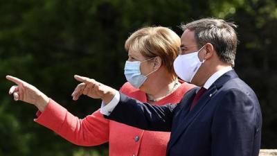 Партия Меркель потерпела поражение на ключевых выборах в двух землях в ФРГ - экзит-полы