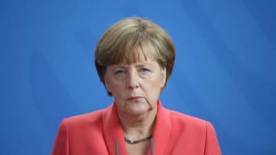 Партия Меркель проигрывает местные выборы в двух регионах