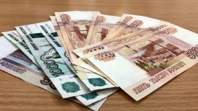 Россиянам объяснили негативный эффект от раздачи «вертолетных денег»