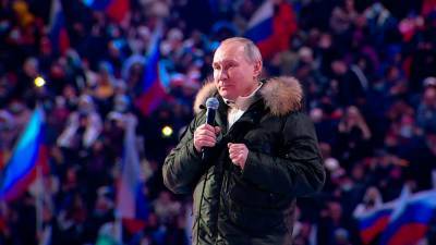 Путин прибыл на концерт в Лужниках, посвященный годовщине воссоединения Крыма с РФ