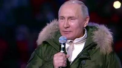 Путин прибыл в "Лужники" на концерт, посвященный воссоединению Крыма с Россией