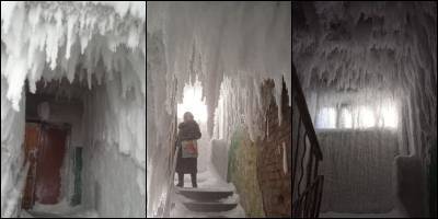 Ледяные сталактиты захватили жилой подъезд - В Печоре оледенел вход в дом, фото - ТЕЛЕГРАФ