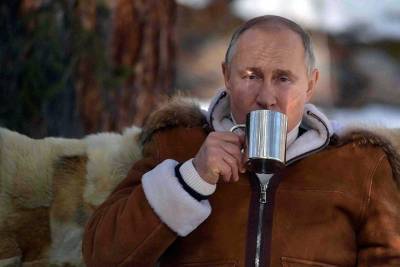 Кремль опубликовал фото сибирского отдыха Путина в доме Шойгу, не назвав регион