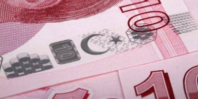 Турецкая лира обвалилась на 14% после отставки главы центробанка