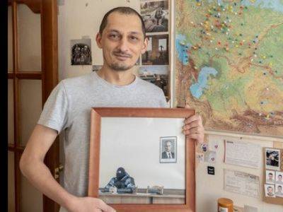 Суд оштрафовал фотографа Маркова за акцию у Мосгорсуда