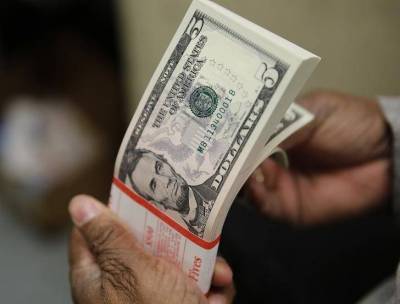 Доллар растет из-за беспокойства вокруг COVID-19
