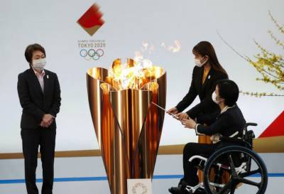 В Японии торжественно зажгли олимпийский огонь летних игр в Токио: фото, видео