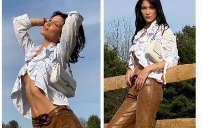 Образ дня: Белла Хадид позирует в блузе с рюшами и кожаных брюках (ФОТО)