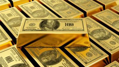 Золото дешевеет 28 марта после роста ранее и на укреплении доллара