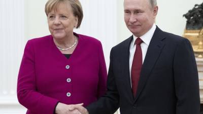 В Кремле рассказали об организации конференции Путина, Меркель и Макрона