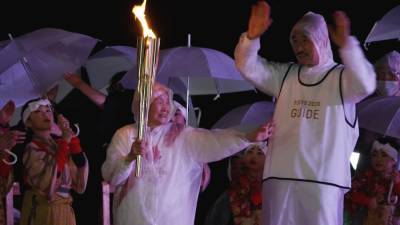 Олимпийский факел в Японии пронесла 104-летняя жительница страны.