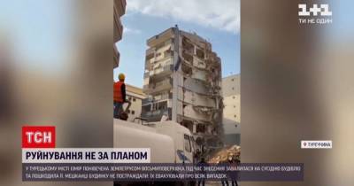 Разрушениях не по плану: в Турции многоэтажка при сносе повредила другой дом
