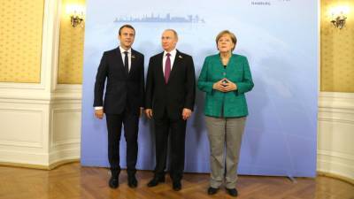В Кремле рассказали о планах Путина обсудить ситуацию в Донбассе с Меркель и Макроном