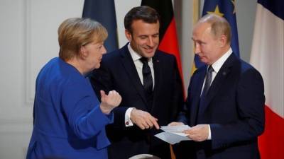 В Кремле сообщили, когда пройдет конференция Путина, Меркель и Макрона