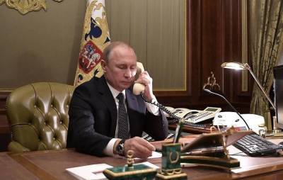 Путин поговорил по телефону с Меркель и Макроном