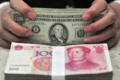 Экономисты плачут: Россия скупает китайский юань, дав пинка доллару